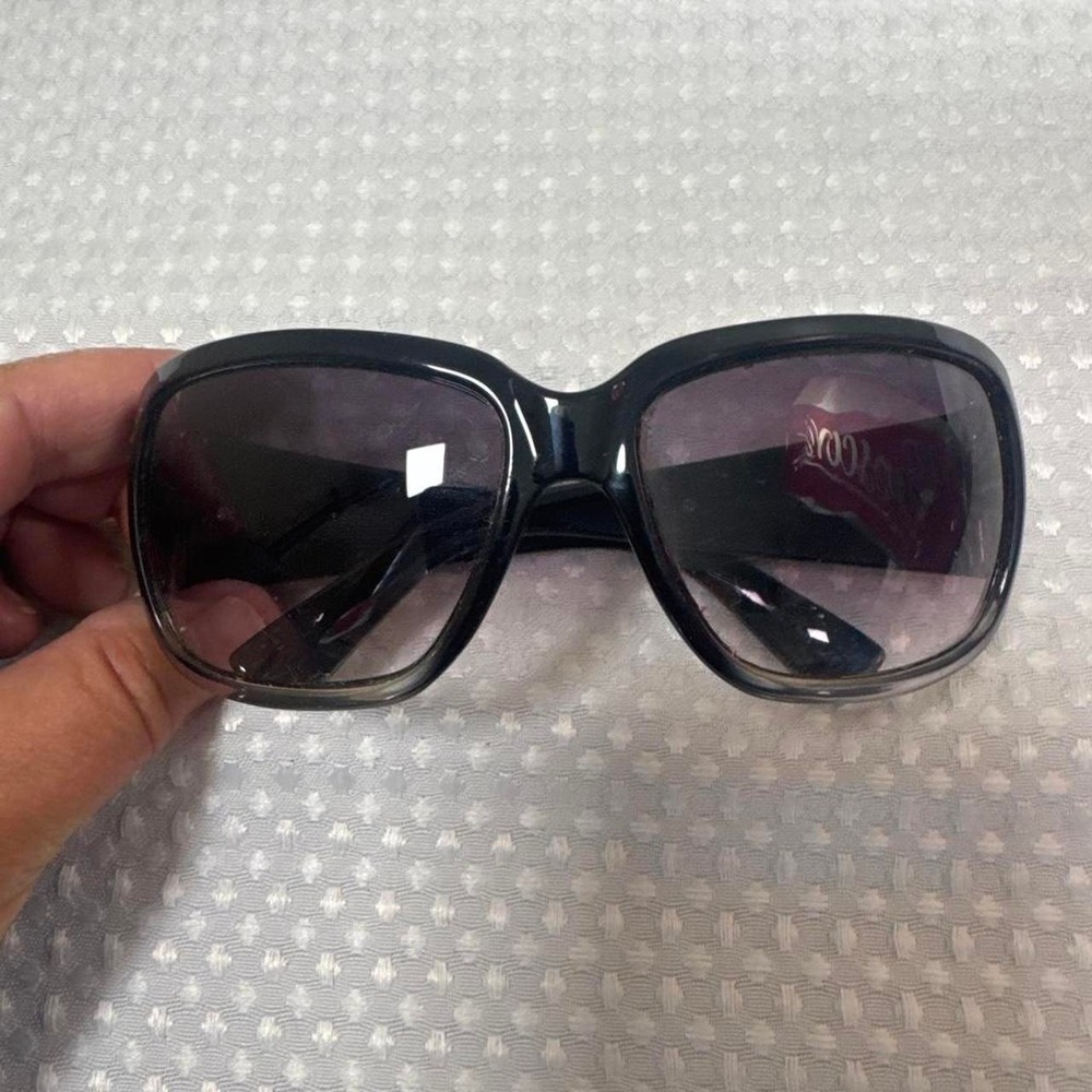 Kenneth Cole sunglasses. This is a  vintage discontinued model.